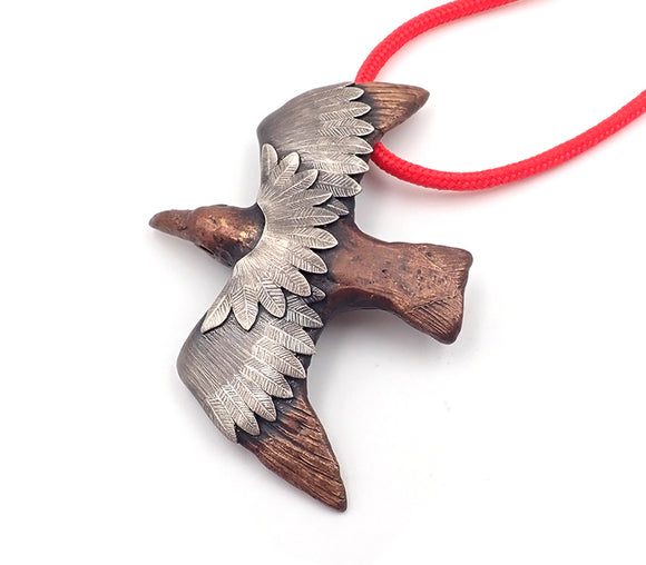 Lisa West bird pendant necklace petrel