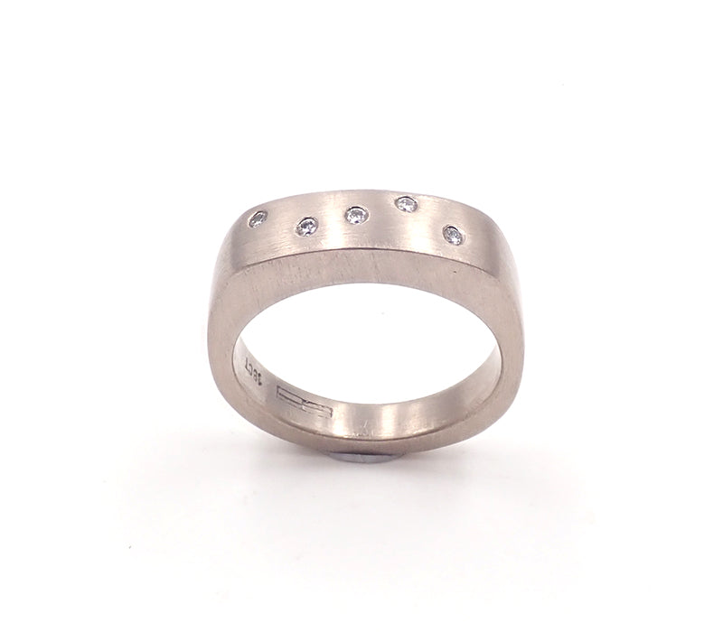 White gold signet ring with diamonds
